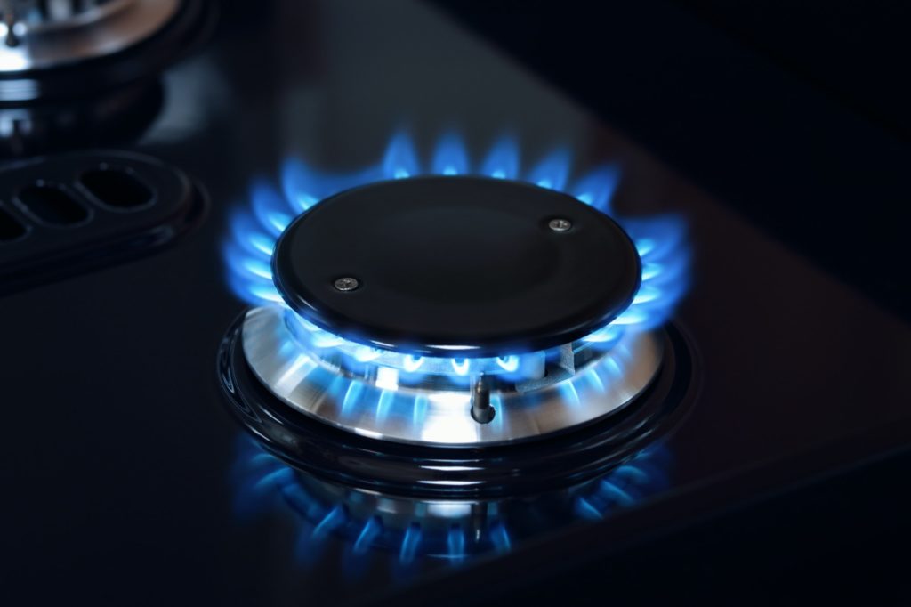 Natural gas burner flame on stove with Edinburgh Gas Renewables