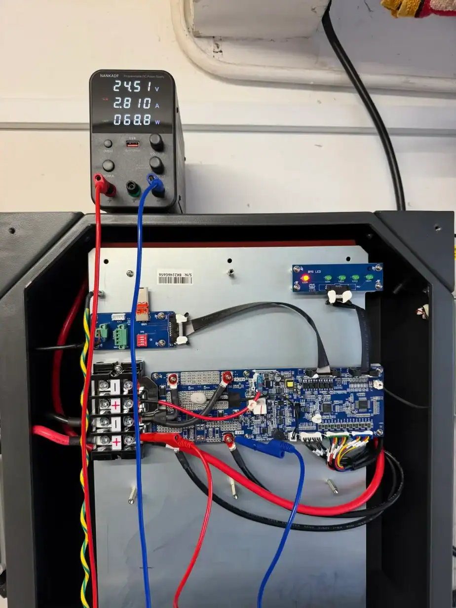 Solar PV battery recharge system with digital voltage and current display.